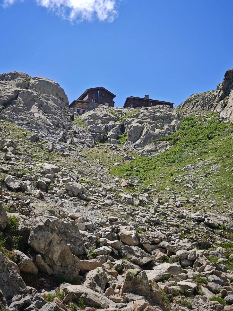 The Refuge du Lac Blanc, sitting on the slabs above the ascent track